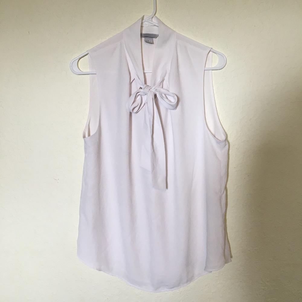 H&M women's white sleeveless blouse. Size L.